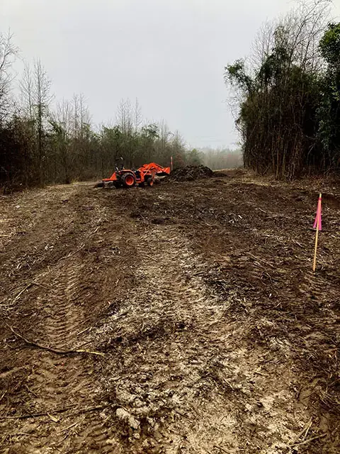 Clearing some land in my Kubota tractor!