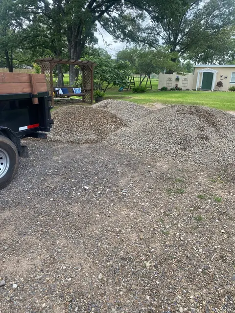 Gravel dump and spread for a customer